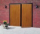 Picture of a pair of Cardale Gemini steel side-hinged garage doors in Golden Oak laminate